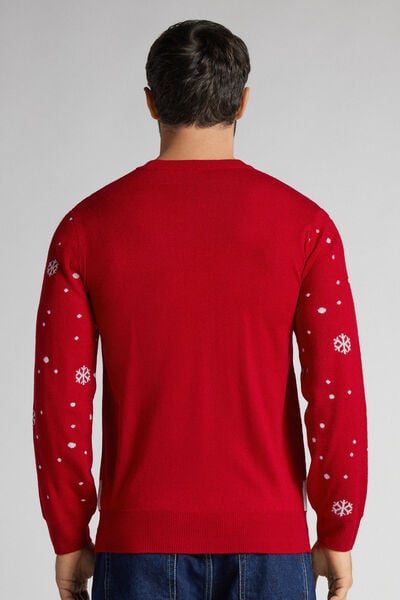 Weihnachtsmann-Pullover und Haus mit Lichtern