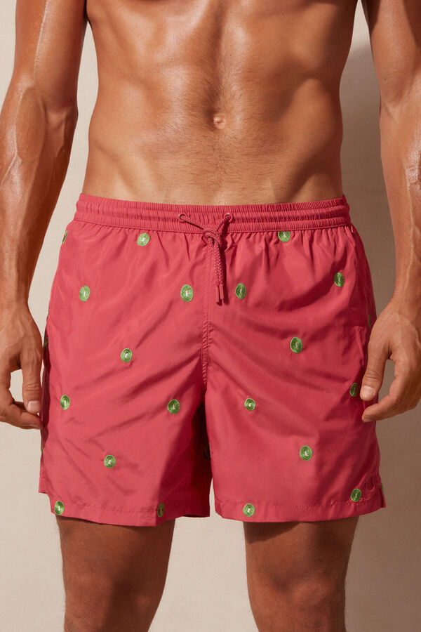 Badshorts med broderade kiwier