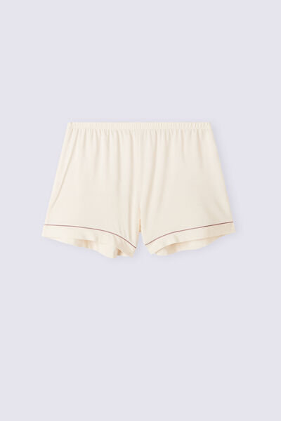 Shorts i modal med kontrasterande passpoal