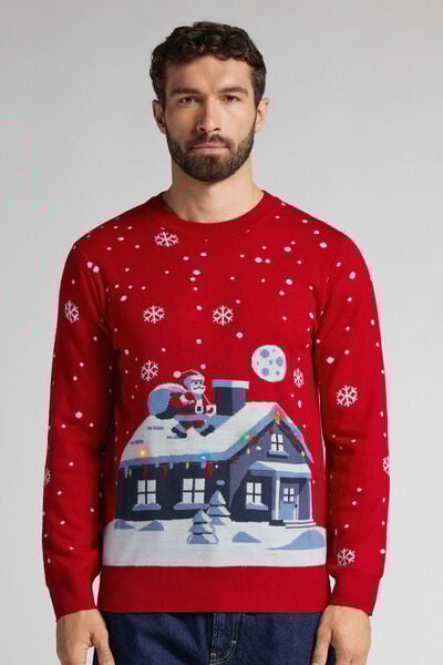 Weihnachtsmann-Pullover und Haus mit Lichtern