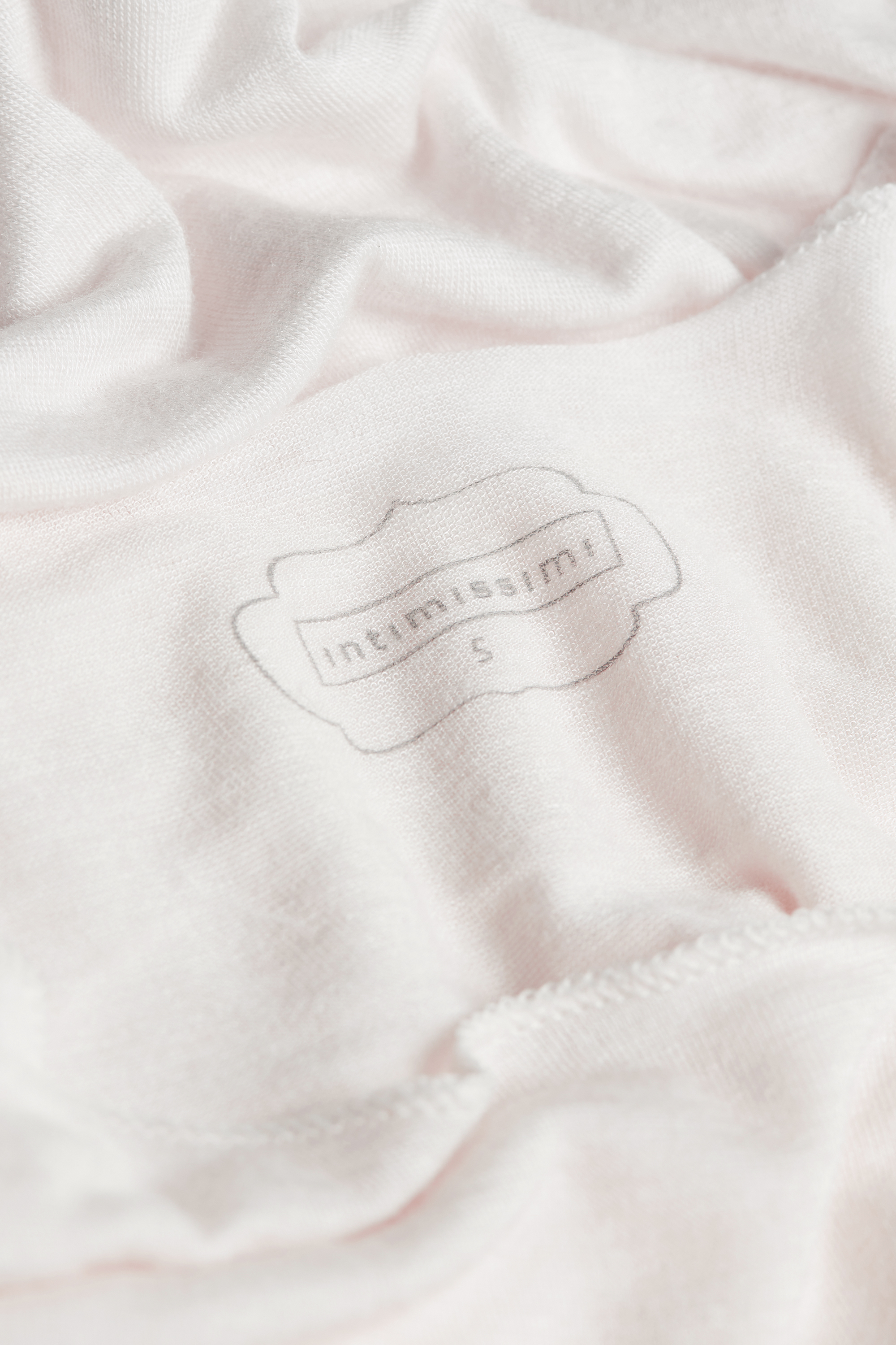 モダール＆カシミヤ 長袖ボディスーツ